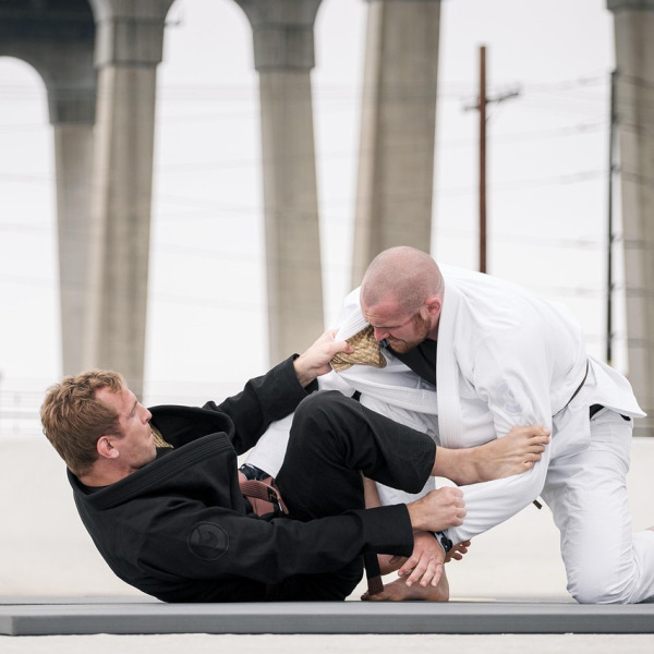 jiu jitsu coach with students